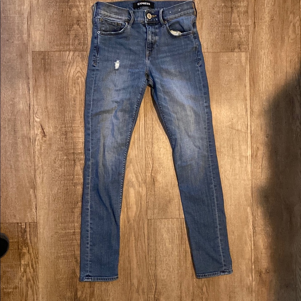 Women’s Express Blue Skinny Jeans with Vintage-Inspired Fading